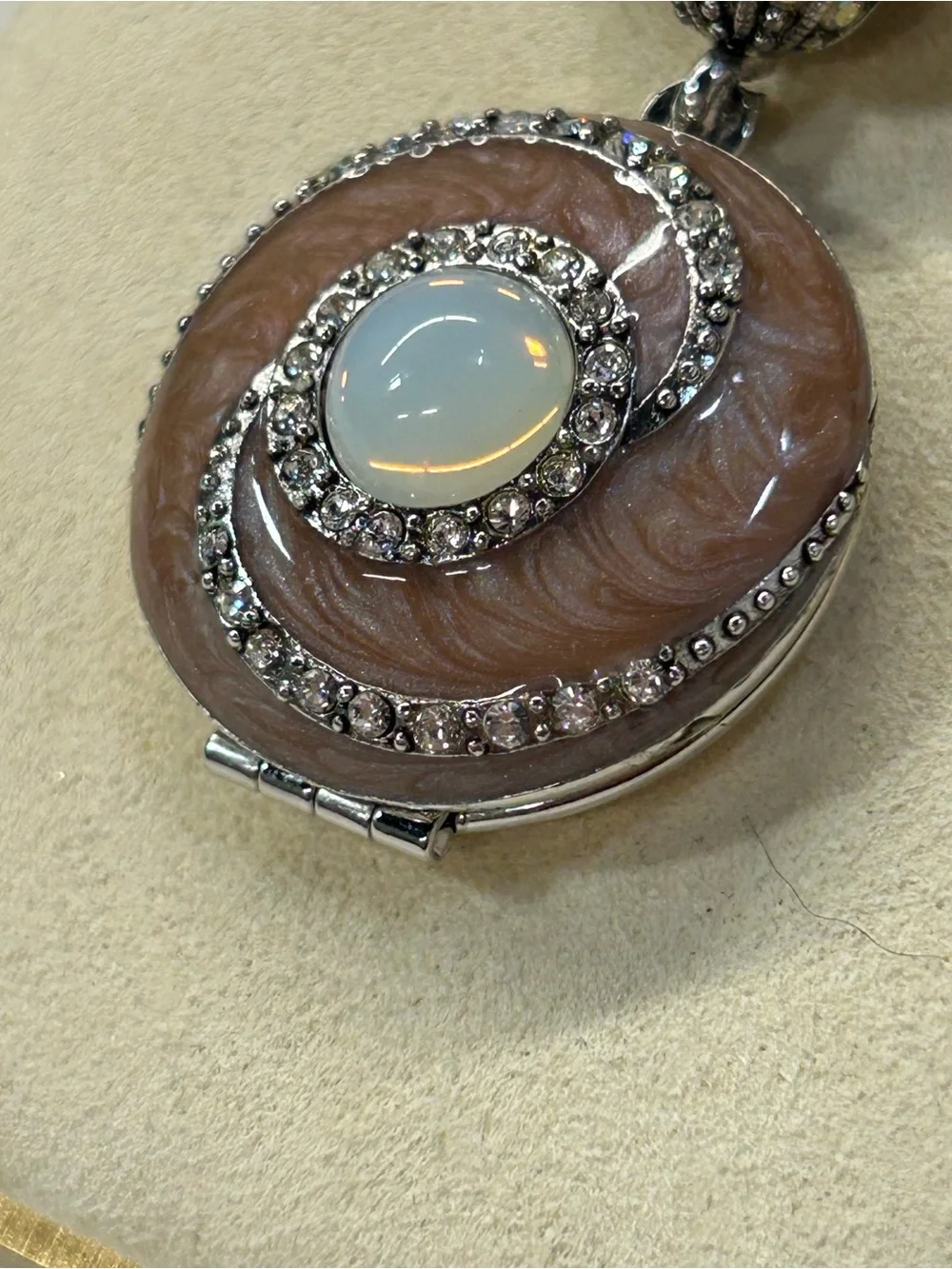 Vintage Joan Rivers locket brooch with rhinestone bow